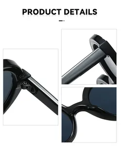 Gros plan sur les charnières robustes et le pont de ces lunettes de soleil rondes noires