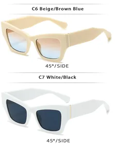 Vue détaillée de lunettes de soleil œil-de-chat tendance en beige et blanc à 45 degrés