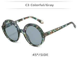 Vue détaillée à 45 degrés de lunettes de soleil rondes XXL avec monture colorée