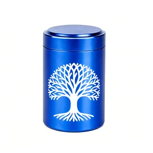 Detailed view of blue aluminum mini urn with white Tree of Life design