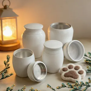Detail showing elegant white aluminum alloy urns for pet ashes in different sizes