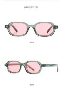 Detailed front and 45-degree side views of green oval sunglasses with pink lenses