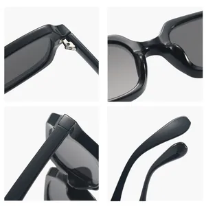 Gafas de sol cuadradas negras retro con protección UV en vistas detalladas de primer plano