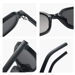 Retro oval sunglasses in black with UV protection and minimalist frame design