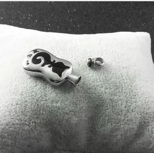 Silver cat-shaped titanium steel cremation urn pendant for pet memorial.