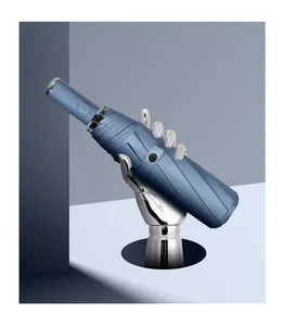 Detailed macro view of a navy blue automatic folding umbrella with a sleek design.