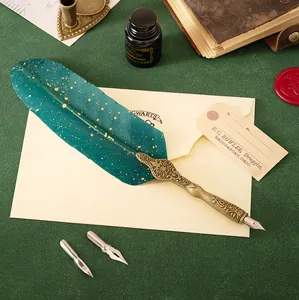 Detail view of a premium vintage green quill pen with gold specks on a retro letter.