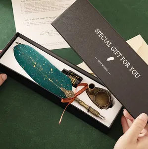 Luxurious vintage teal feather quill pen set in gift box with ink and antique brass stand