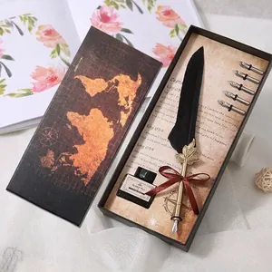 Elegant vintage European quill pen set with ink and replacement nibs in a gift box