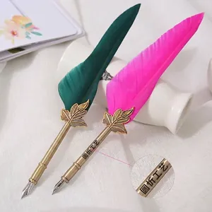 Vintage European style feather quill pen set in emerald green and vibrant pink for gifts