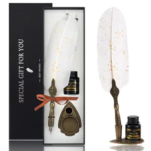 Elegant vintage quill pen set with engraved bronze stand and ink in premium black gift box