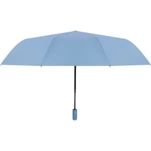 Automatic folding umbrella in sky blue opened on a clean white background