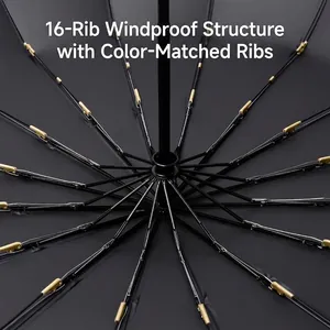 Detailed view of the 16-rib reinforced windproof structure of a black automatic folding umbrella