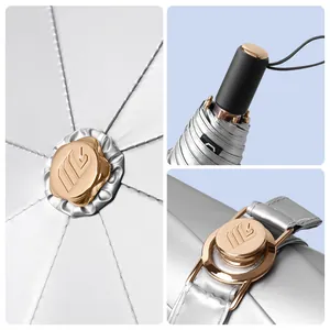 Elegant titanium silver folding umbrella with rose gold hardware accents