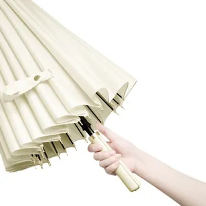 Elegant cream-colored 24-rib long handle umbrella featuring a comfortable hand grip