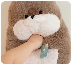 Detail view highlighting the ultra-soft and fluffy texture of this plush sea otter doll