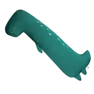 Long coussin peluche dinosaure vert doux pour le sommeil et la décoration du canapé