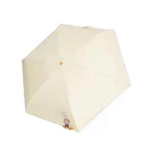 Draagbare crème UV-bescherming zon- en regenscherm met schattig konijntjespop decor