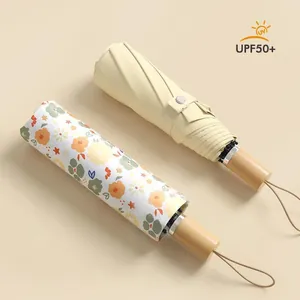 Elegant floral and cream folding parasols with UPF50+ UV protection for women
