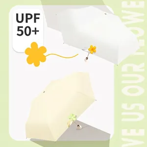 Portable five-fold sun umbrella with flower detail and UPF 50+ UV protection.