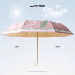 UPF50+ anti-UV pink floral folding umbrella for sun and rain protection with gold handle