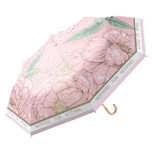 Elegant pink floral folding umbrella with UPF 50+ UV protection and J-shaped handle