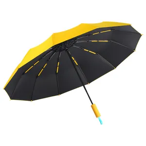 Large automatic folding sun and rain umbrella with yellow canopy and black UV coating
