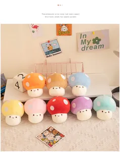 Close-up of cute colorful mushroom plush toy pendants with embroidered smiling faces