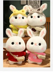Detailed group photo of soft cartoon white rabbit plush toys in colorful knitted sweaters