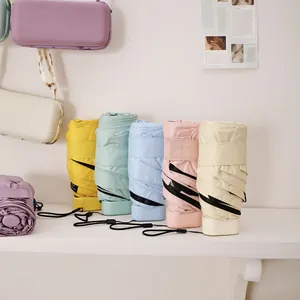 Kompakte sechsfach gefaltete Mini-Taschenschirme in Pastellfarben für Sonne und Regen