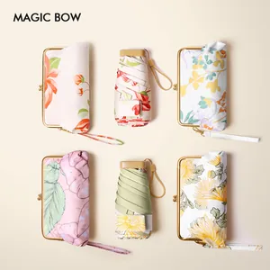 Mini parapluie de poche portable à 6 plis avec motifs floraux pour soleil et pluie
