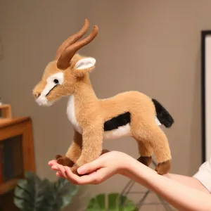 Realistic standing Tibetan antelope plush toy with long horns shown in hand display