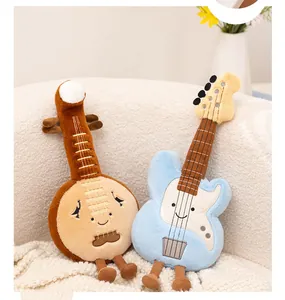 Close-up of cute guitar and banjo musical instrument plush toys with smiling faces