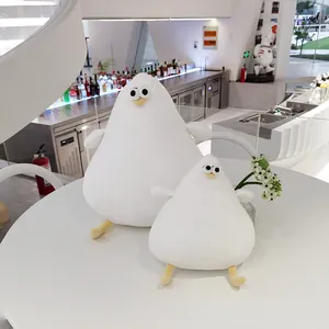 Cute fat white Danish seagull plush toys on a modern table, perfect gift for bird lovers