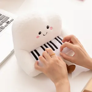 Adorable white piano plush toy with a smiley face for children's early music enlightenment