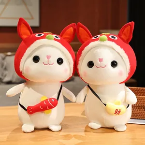 Adorable pair of white bunny plush toys wearing festive red hats and small bags