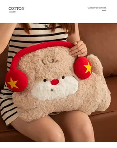Soft scruffy puppy plush pillow with headphones being held as a decorative sofa cushion