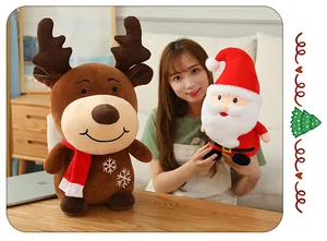 Detail view of plush Santa and reindeer toys for cozy Christmas home decoration