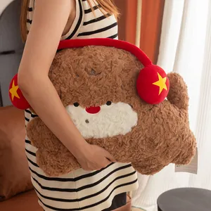 Adorable brown curly fur dog plush pillow with red headphone decoration in cozy setting