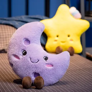 Soft Nordic style purple moon and yellow star plush pillows displayed on a cozy bed