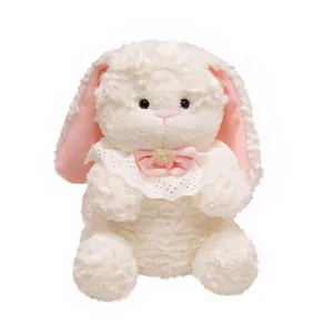 Soft white long-eared bunny plush toy featuring a delicate lace bib and pink bow