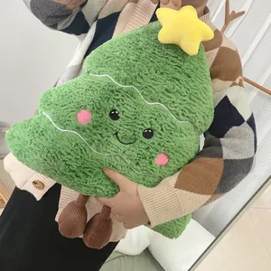 Coussin en peluche sapin de Noël en sherpa doux avec visage souriant