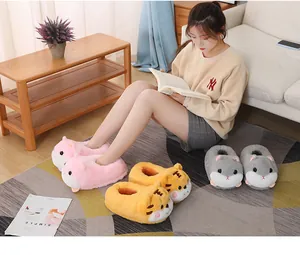 Cozy cartoon animal plush slippers featured in a warm indoor living room setting