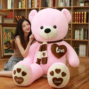 Large pink teddy bear with brown scarf and heart embroidery decoration for gift