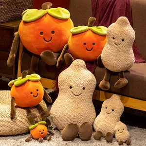 Adorable plush peanut and persimmon toys with long limbs in a cozy home setting