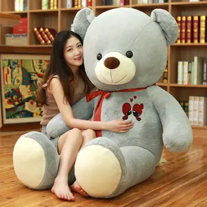Giant grey teddy bear plush toy with red scarf and heart embroidery, ideal for gifts