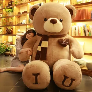 Giant brown teddy bear plush toy with scarf and heart embroidery, ideal for holiday gifts