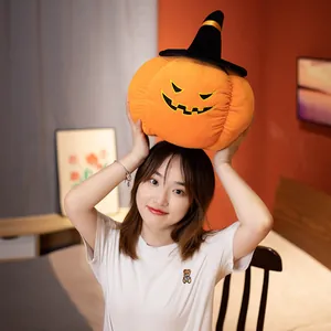 Funny Halloween pumpkin plush toy with a black witch hat, soft decorative throw pillow