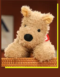 Close-up of a fluffy West Highland Terrier plush toy with a soft texture and cute red collar