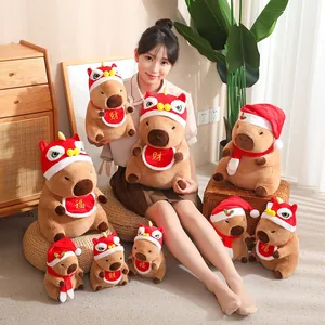 Peluches de carpincho festivos con sombreros de Navidad y Año Nuevo para regalo